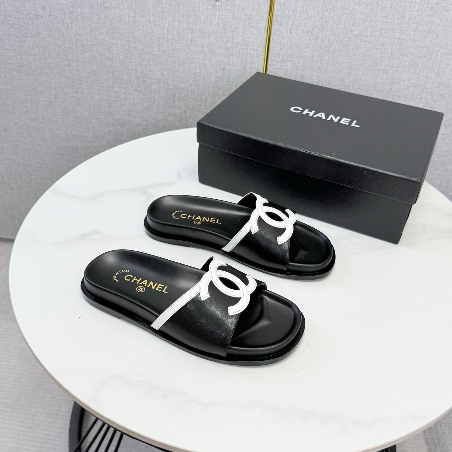 CHANEL 26S ICONIC CC SLIDES IN BLACK LAMBSKIN