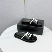CHANEL 26S ICONIC CC SLIDES IN BLACK LAMBSKIN