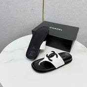 CHANEL 26S CC THONG SLIDES IN WHITE AND BLACK LAMBSKIN