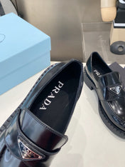 PRADA 26S LOAFERS IN BLACK CALFSKIN WITH LOGO SILVER HARDWARE