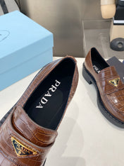 PRADA 26S LOAFERS IN DARK BROWN CROCODILE PRINT CALFSKIN