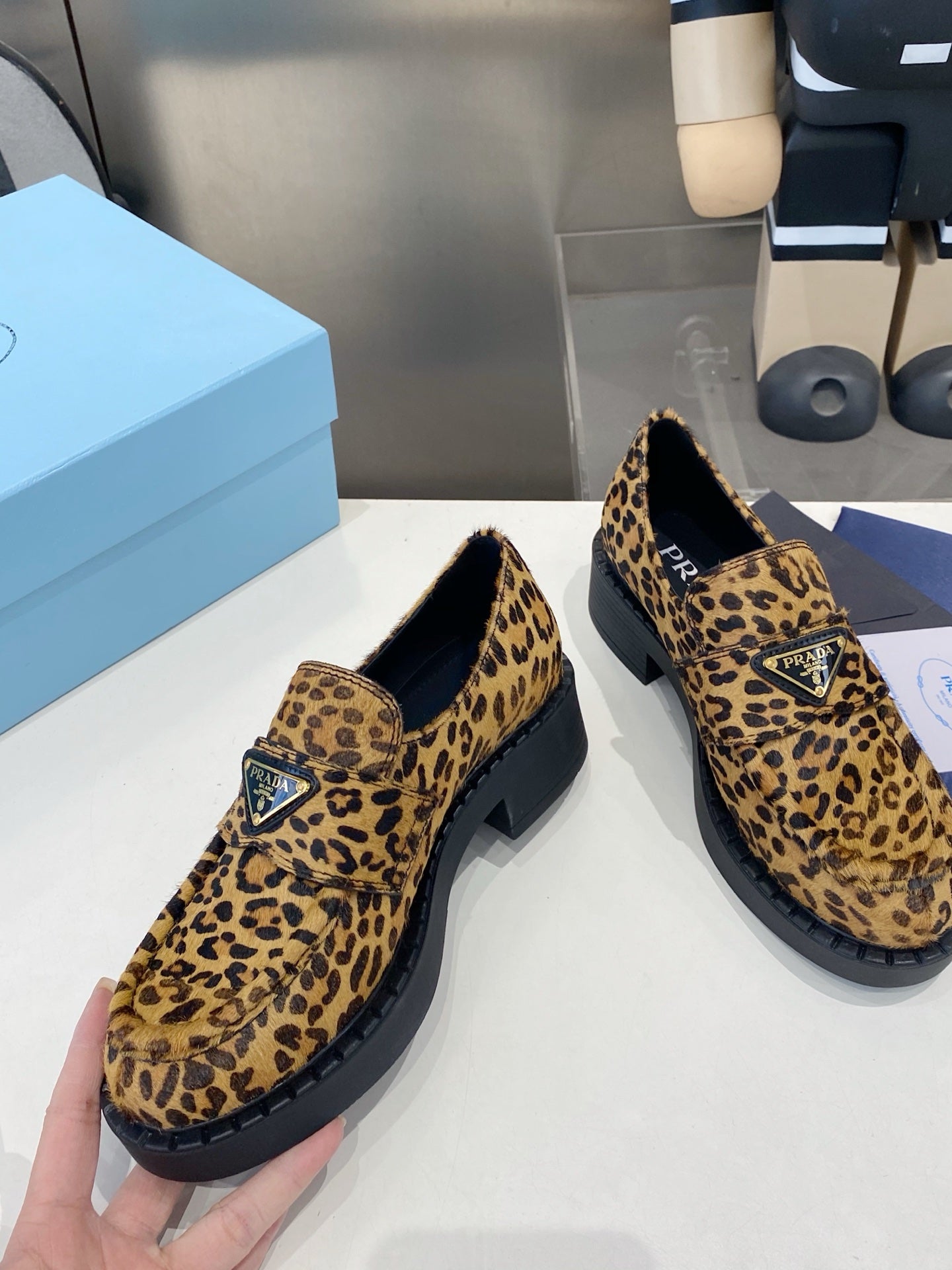 PRADA 26S LOAFERS IN BROWN LEOPARD PRINT PONY HAIR