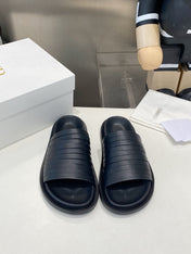 THE ROW 26S MULTI STRAP SLIDES IN BLACK CALFSKIN
