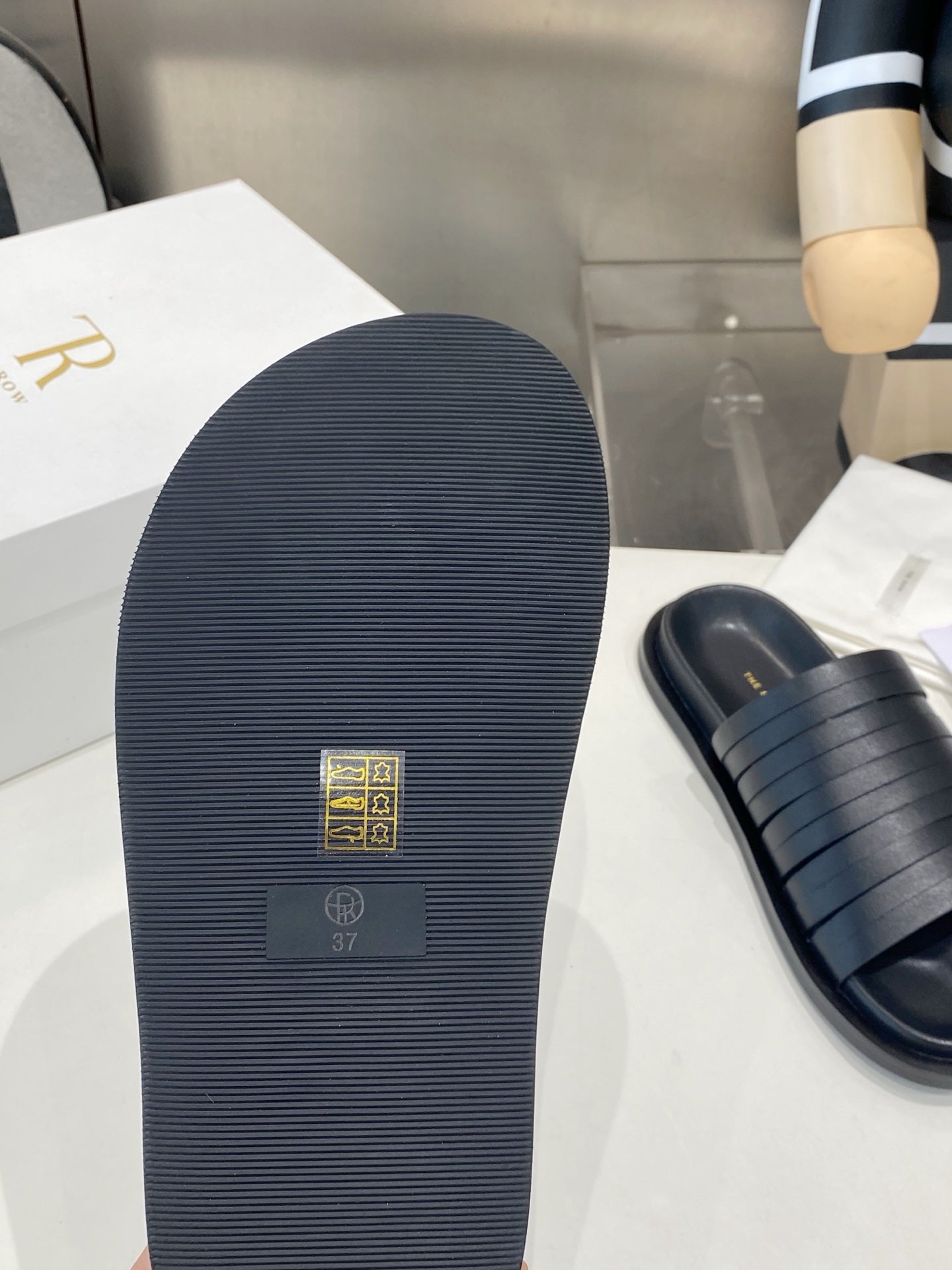 THE ROW 26S MULTI STRAP SLIDES IN BLACK CALFSKIN