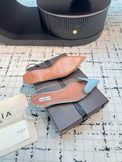 ALAIA FLAT SLINGBACK IN LIGHT BLUE PATENT CALFSKIN AND FILM
