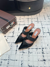 ALAIA HIGH HEEL 9 CM IN BLACK CALFSKIN