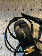 CLEMENCE MULTI TRIOMPHE 45 MM SANDAL IN BLACK LAMBSKIN