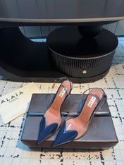 ALAIA HIGH SLINGBACK 25S 90 MM IN NAVY BLUE CALFSKIN