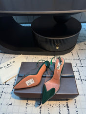 ALAIA HIGH SLINGBACK 25S 90 MM IN DARK GREEN CALFSKIN