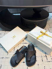 THE ROW 26S THONG SLIDE SANDALS IN BLACK CALFSKIN