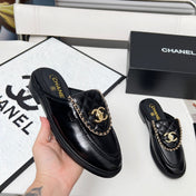 CHANEL 25S MULES WITH CHAIN DETAIL IN BLACK GLOSSY CALFSKIN GOLD HARDWARE