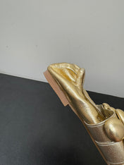 ALAIA SPHERE BALLET FLATS IN GOLDEN LAMBSKIN