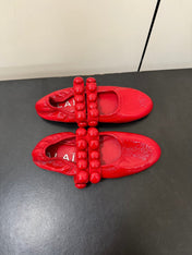 ALAIA SPHERE BALLET FLATS IN CHERRY RED LAMBSKIN