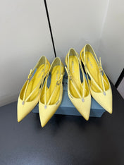 CUT-OUT PUMPS WITH BEAD BUCKLE IN LIGHT YELLOW SATIN