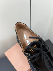 LACE-UP LOAFERS WITH THICK SOLE IN BLACK SHINY SHEEPSKIN