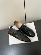 CELINE 26S MINIMAL LACE-UP SHOES IN BLACK GLOSSY CALFSKIN