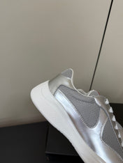 PRADA 26S SNEAKERS IN SILVER CALFSKIN AND WHITE MESH