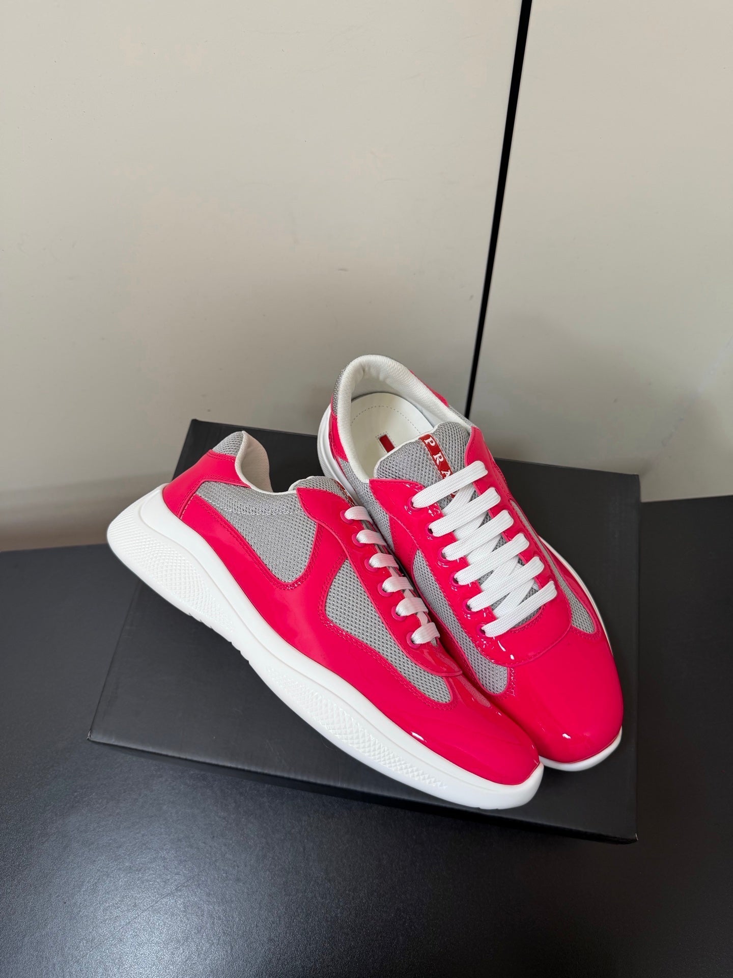 PRADA 26S SNEAKERS IN PINK PATENT CALFSKIN AND WHITE MESH