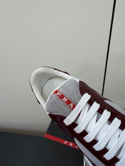 PRADA 26S SNEAKERS IN BURGUNDY RED PATENT CALFSKIN AND WHITE MESH