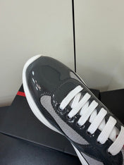 PRADA 26S SNEAKERS IN GRAY PATENT CALFSKIN AND WHITE MESH