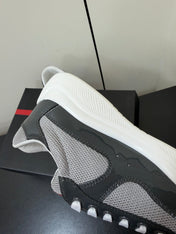 PRADA 26S SNEAKERS IN GRAY PATENT CALFSKIN AND WHITE MESH