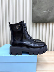 PRADA 25S MONOLITH BOOTS IN BLACK GLOSSY CALFSKIN