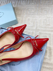 SLINGBACK PUMPS ATTACHED BOW IN PASSION RED GLOSSY CALFSKIN