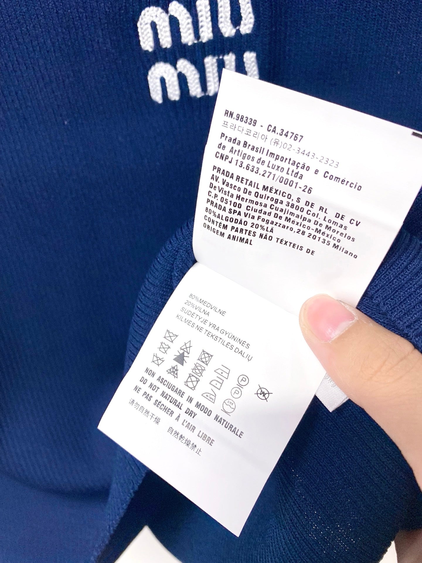 MIUMIU 26S SHORT-SLEEVED KNIT POLO SHIRT STYLE 1055
