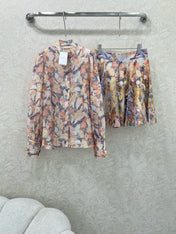 ZIMMER STAND-COLLAR PRINTED STUDDED TOP AND HIGH-WAIST FLARED SKIRT SET