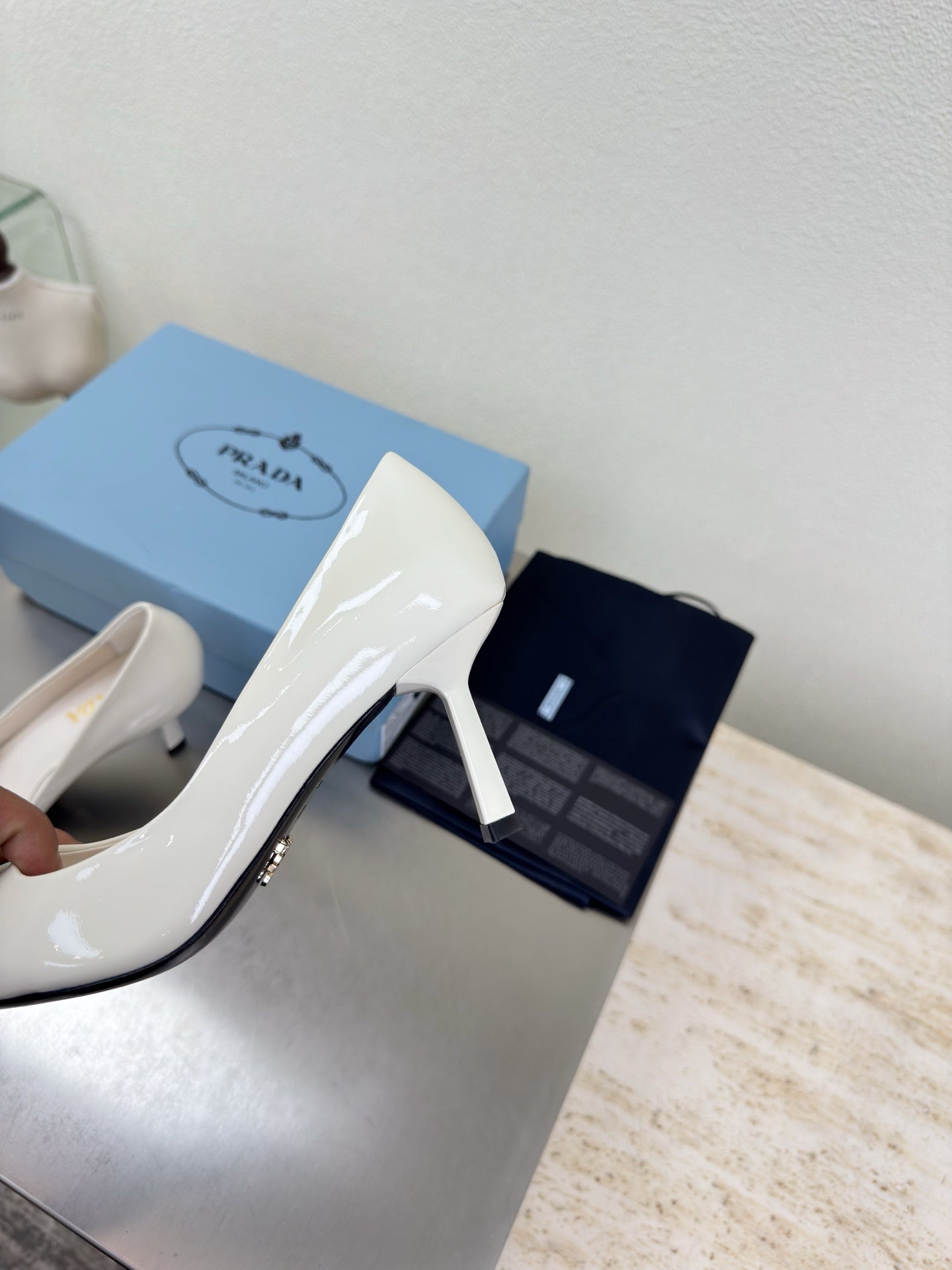 PRADA 26S POINTED TOE PUMPS 75MM IN WHITE PATENT CALFSKIN