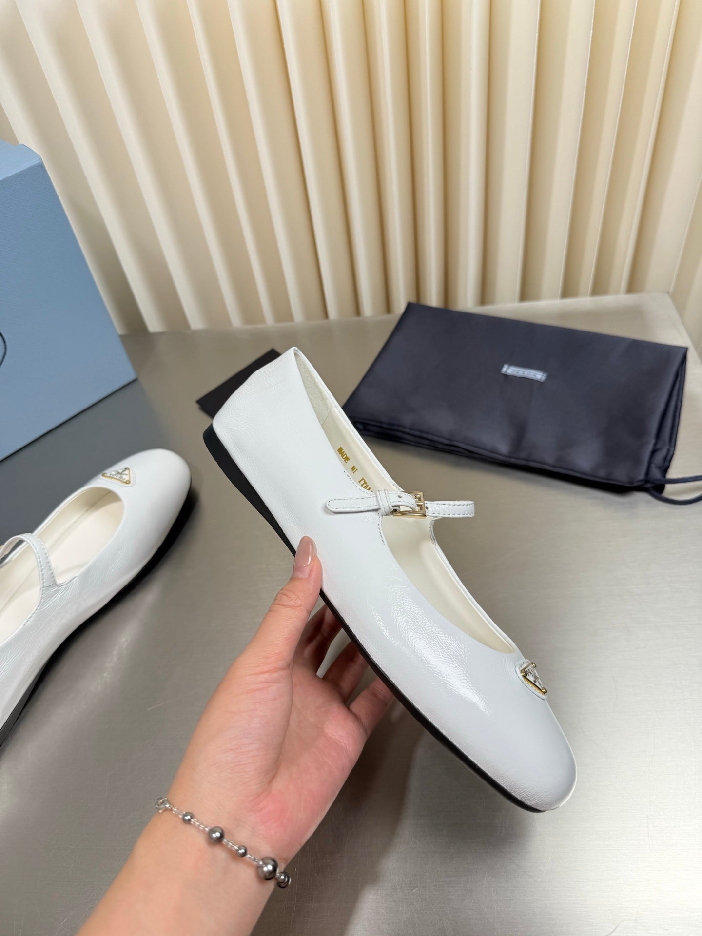 PRADA 26S MARY JANE FLATS IN WHITE CALFSKIN
