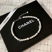 CHANEL 26S DOUBLE C LOGO PEARL NECKLACE WITH CRYSTAL DETAIL IN SILVER METAL 631884