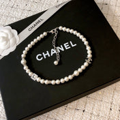 CHANEL 26S DOUBLE C LOGO PEARL NECKLACE WITH CRYSTAL DETAIL IN SILVER METAL 631884