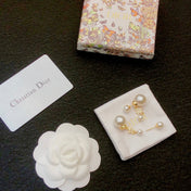 CD 26S PEARL STAR & FLOWER DROP EARRINGS IN GOLD TONE METAL WITH CRYSTAL 631008