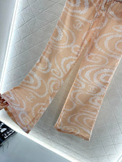 CHANEL BEIGE PRINTED DENIM PANTS