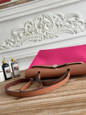 ZIP CABINE 31 BAG IN FUCHSIA PINK CANVAS AND BRONZE BROWN CALFSKIN