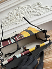 HERBAG ZIP 31 LAQUERED BAG IN BROWN MIX YELLOW H PLUME CANVAS