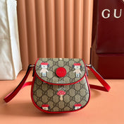 CHILDREN'S PRINTED GG SHOULDER BAG IN BEIGE AND DARK BROWN GG CANVAS RED TRIM