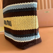 TOTE BAG 40 IN STRIPED PATTERN OF BROWN BLUE AND YELLOW WOVEN RAFFIA