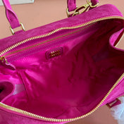 ARCADIE BAG 27 IN FUCHSIA SUEDE GOLD HARDWARE