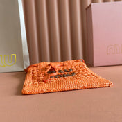 MIUMIU 26S WANDER BUCKET BAG 23 IN ORANGE RAFFIA WITH LEATHER TRIM