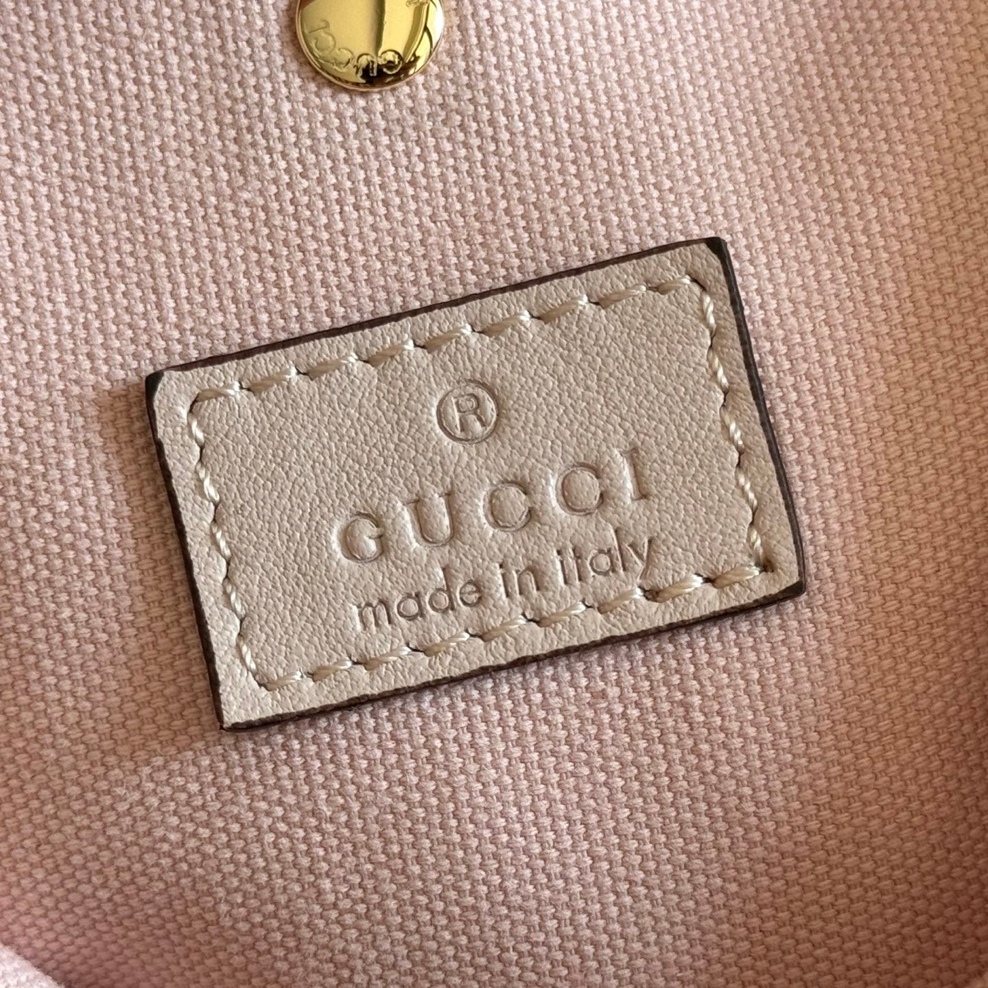GUCCI 26S GG EMBLEM BUCKET BAG 19 IN LIGHT PINK COATED FABRIC