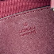 GUCCI 26S GG EMBLEM BUCKET BAG 22 IN DARK RED COATED FABRIC