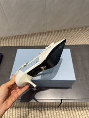 PRADA 26S POINTED TOE CUT OUT HIGH HEELS 75MM IN WHITE CALFSKIN WITH BOW