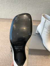 ANKLE BOOTS IN WHITE LOGO EMBOSSED SOFT SHEEPSKIN