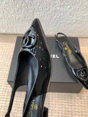 FLAT SLINGBACKS IN BLACK PATENT CALFSKIN