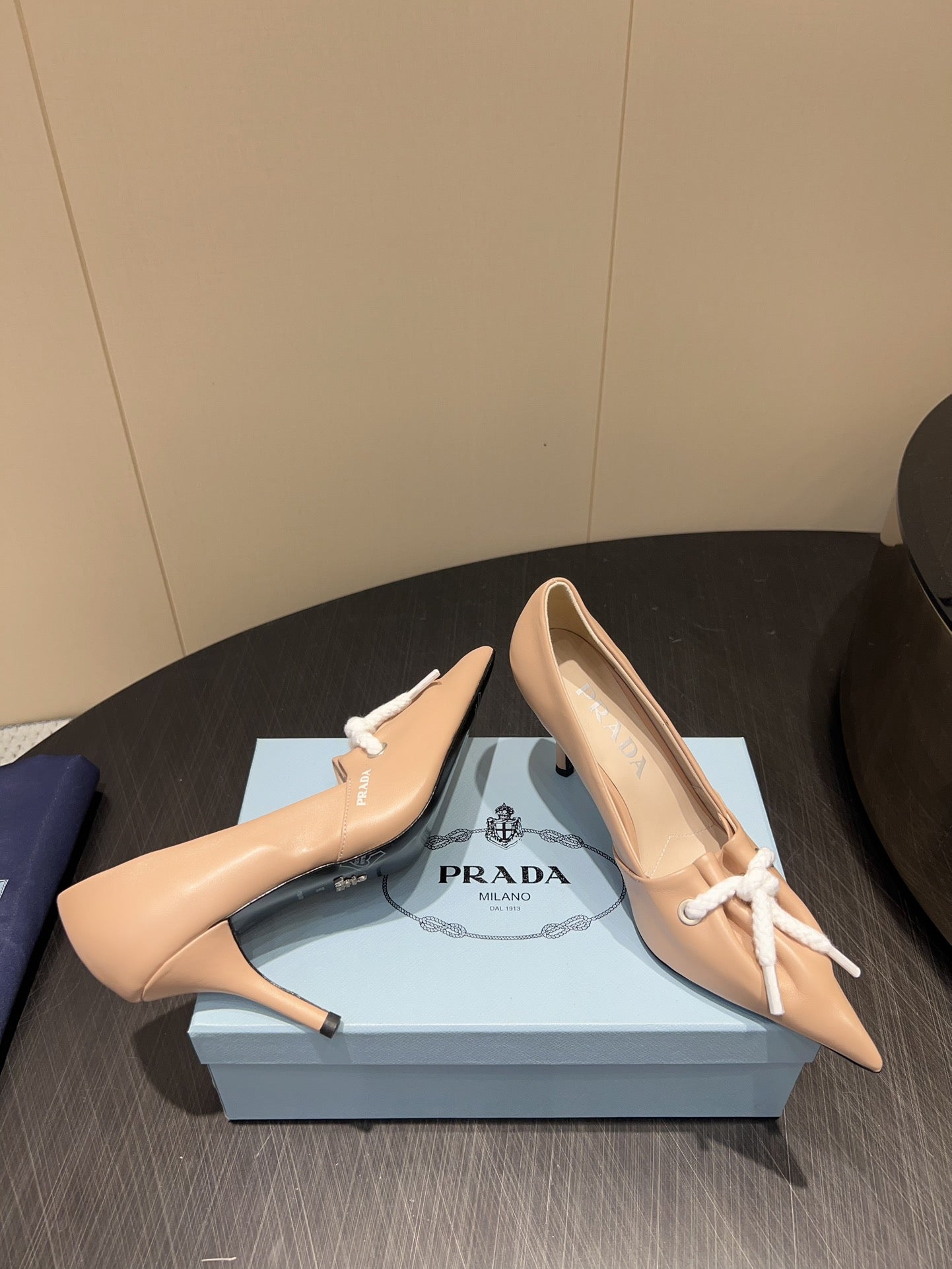 PRADA 25S POINTED TOE HIGH HEELS 85MM IN BEIGE LAMBSKIN WITH TIE UP DESIGN