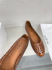 ALAIA BALLET FLAT IN CARAMEL BROWN MESH LAMBSKIN