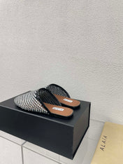 ALAIA FLAT MULES IN STRASS BLACK LAMBSKIN WITH RHINSTONES
