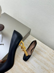 KNOT HIGH PUMP IN BLACK AND GOLD METAL HEEL 9 CM